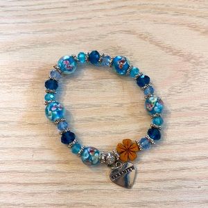 Blue  bracelet with beads it’s stretchy